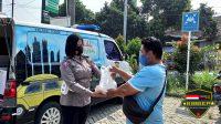 Kapolres Bogor Beserta Bhayangkari Cabang Bogor dan Komunitas Vespa Membagikan Paket Makanan Dalam Rangka Bhayangkara Untuk Negeri