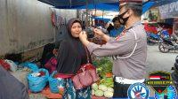 Satlantas Polres Kampar Kembali Lakukan Sosialisasi Protkes dan Bagi Masker di Pasar Kuok