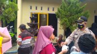 Gebyar Vaksin Polri, Polsek Patia Polres Pandeglang Bagikan Masker Kepada Masyarakat