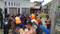 Pol Airud Polres Lamsel, Berikan Bantuan Sembako Kepada 350 KK Yang Terendam Banjir di Desa Bandar Agung-Sragi