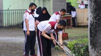 Polres Lamsel Pengecatan di Makam Pahlawan Kesuma Bangsa