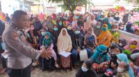 Iptu Mustolih Turun Langsung Pantau Pembagian Bantuan di Kantor Pos Karangsari Jati Agung