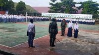 Pos Ramil Jati Agung Koramil 0421-09/ Tanjung Bintang Adakan Upacara Bendera di SMK Nurul Islam Desa Sumber Jaya