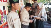Aksi Peduli Dewan Guru SDN 2 Mekargading Santuni Anak Yatim
