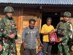 Peduli dan Kasih TNI Satgas Yonif 521/DY Bawa pesan damai Nataru