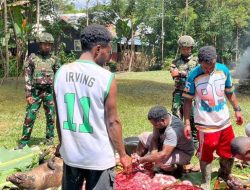 Satgas Yonif 521/DY Bersama Masyarakat Papua Bakar Batu Sambut Tahun Baru