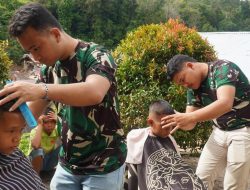 Kodim 0210/Tapanuli Utara Gelar Cukur Rambut Gratis untuk Anak Pengungsi Pascabencana
