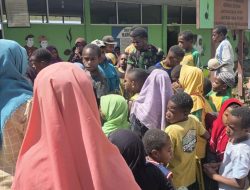 Satgas Yonif 521/DY Bareng Siswa Tata Taman Sekolah di Distrik Walesi