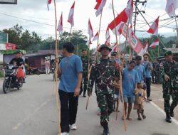 Sambut HUT Ke-81 RI, Prajuri Nanggala Bersama Warga Badau Kibarkan Merah Putih