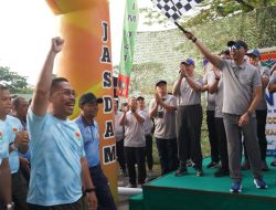 Korem 043/Gatam Bersama Ribuan Peserta Ikuti Jalan Sehat HUT ke-1 Kodam XXI/RI